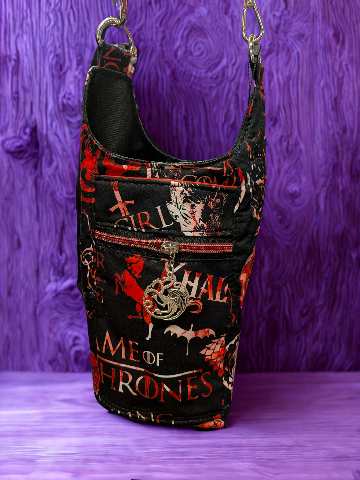 Fantasy inspired handmade water bottle carrier in black and red with adjustable strap
